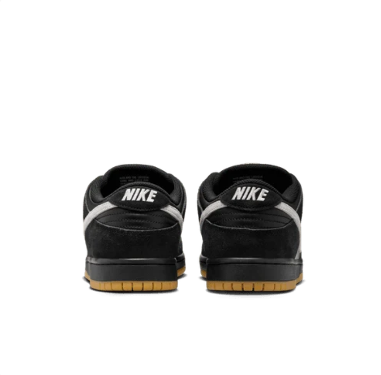 Nike SB Dunk Low Sneakers - Black & White with Gum Sole