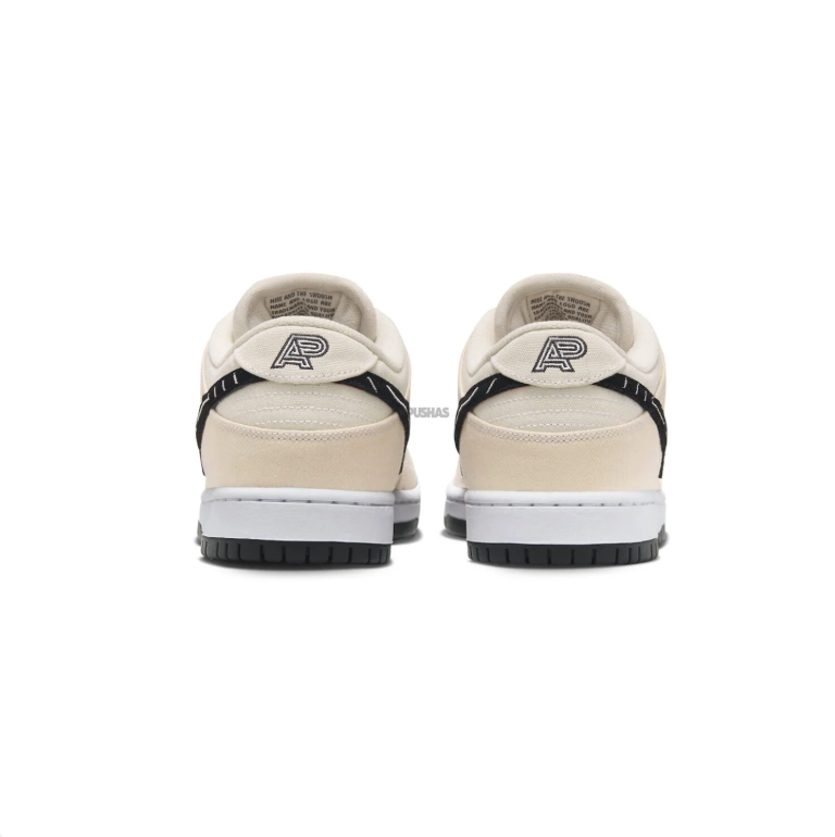 Nike SB Dunk Low Pro Sneakers - Cream & Black with Graphic Swoosh