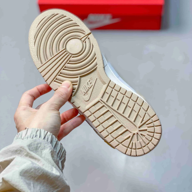 Nike Dunk Low Sneakers - White & Sand Beige with Gold-Tone Swoosh Detail
